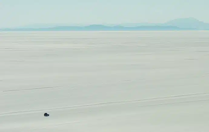 Tiny car on salt flats