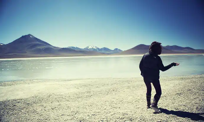 Victoria skimming stones on Salr de Uynui