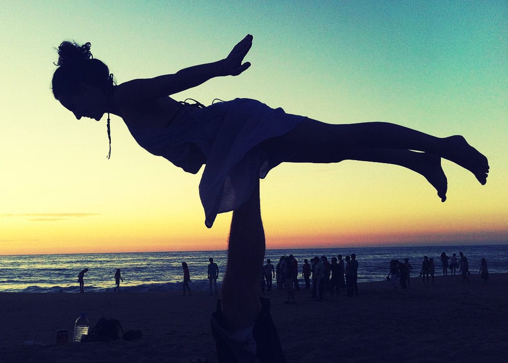 acro yoga at sunset