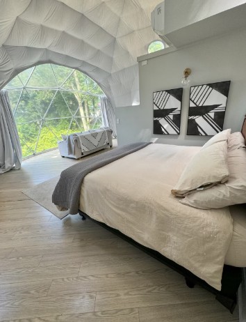 Bed with a view at Asheville Luxury Glamping Dome.