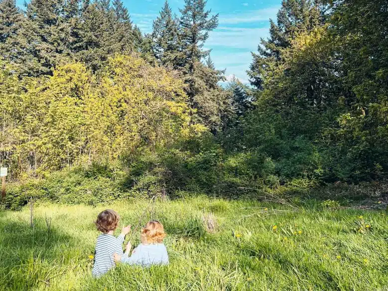 Two kids looking at Mount Hood from Mount Tabor Park