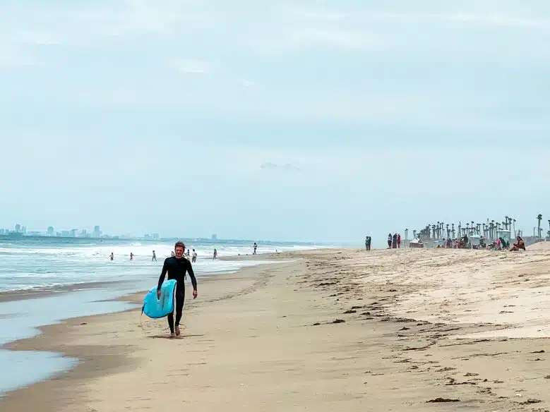 A surfer on Huntington Beach