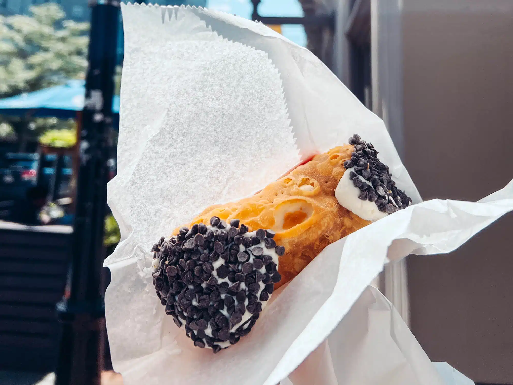 A close up photo of a cannoli at Mike's Pastry, Boston