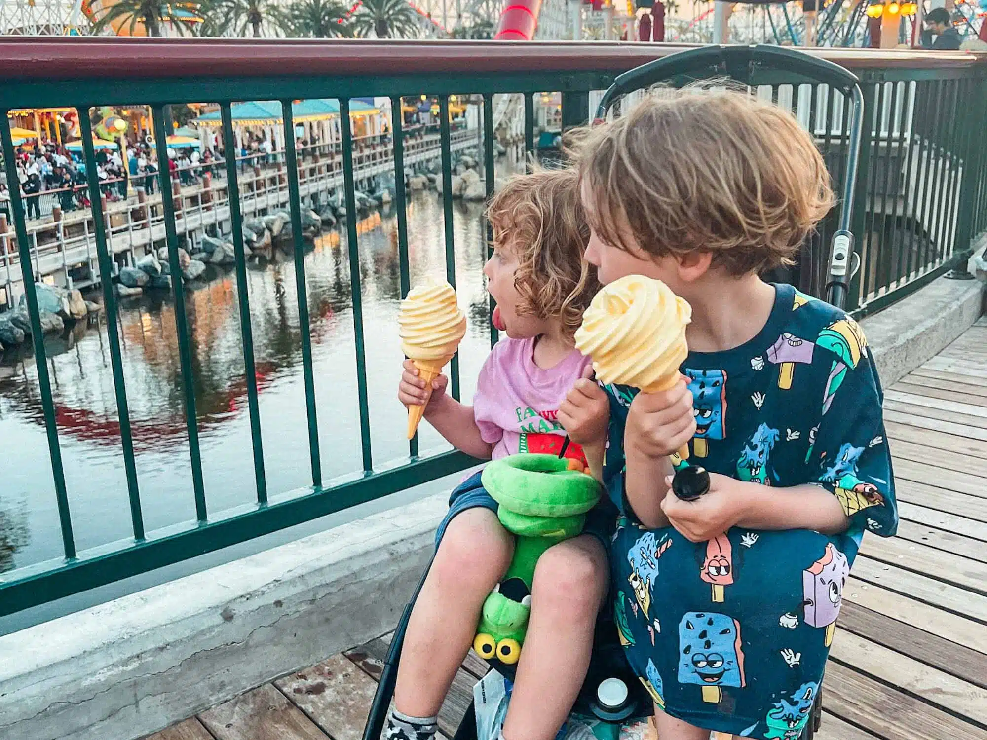 Otis and Arlo eating dole whip at DCA.