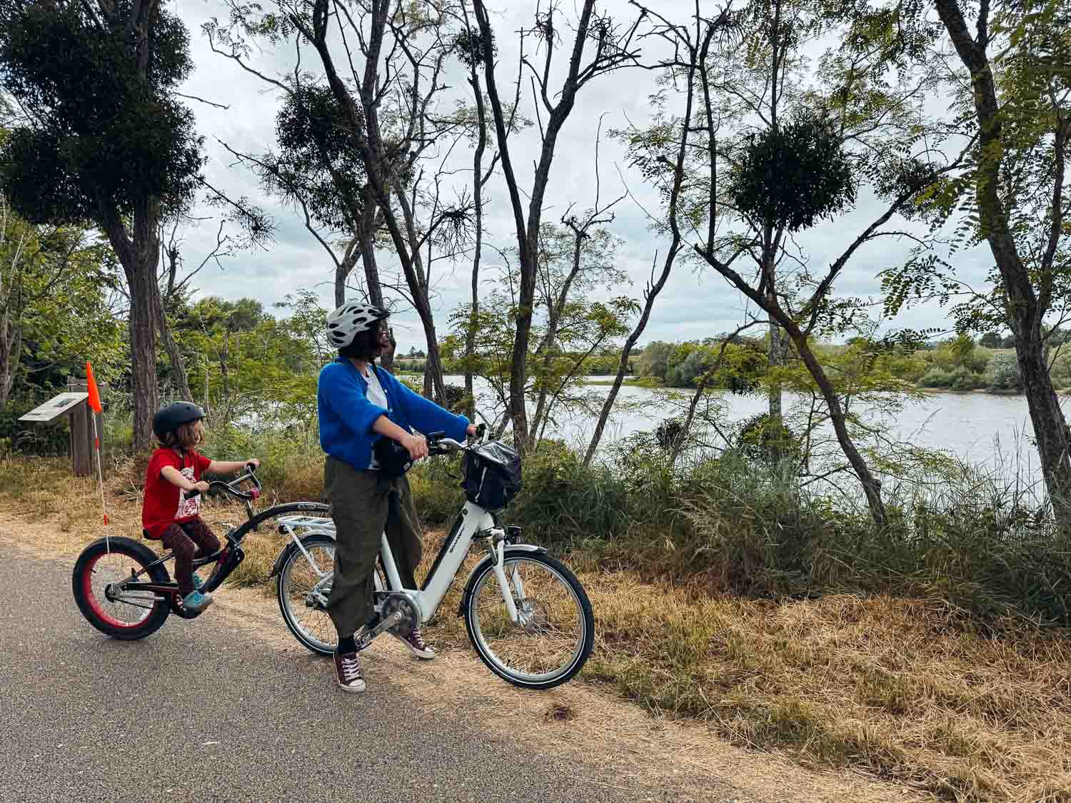 Victoria and kids riding a bike in Loire Valley, France.