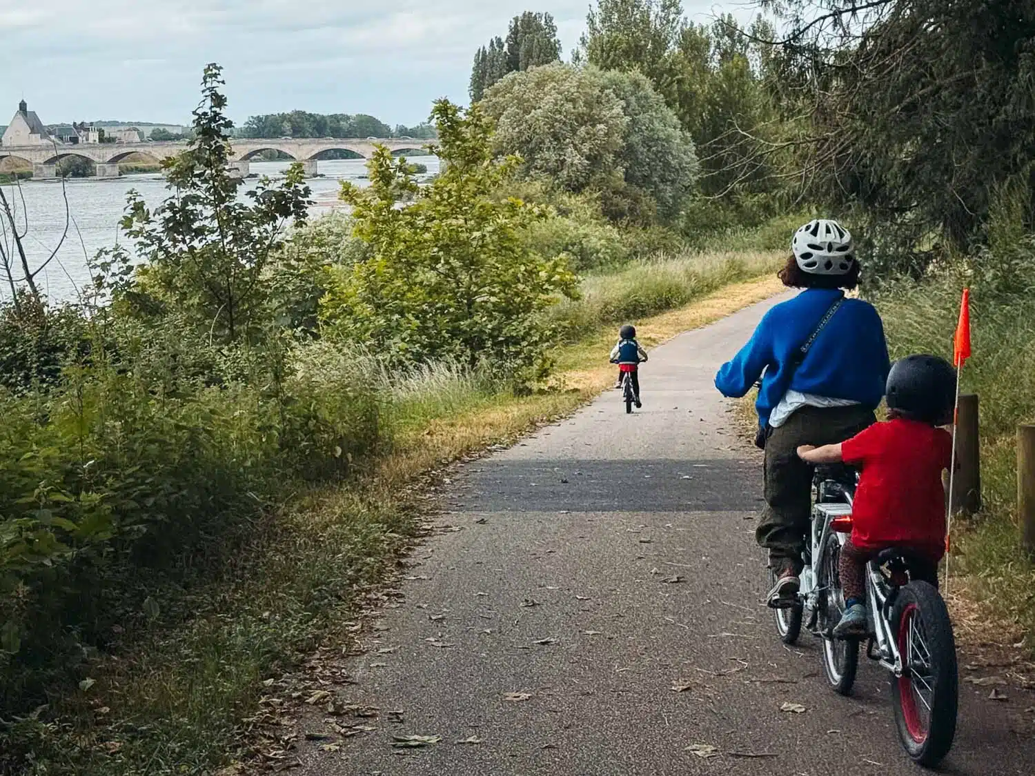 Victoria riding a bike in Loire Valley, France.