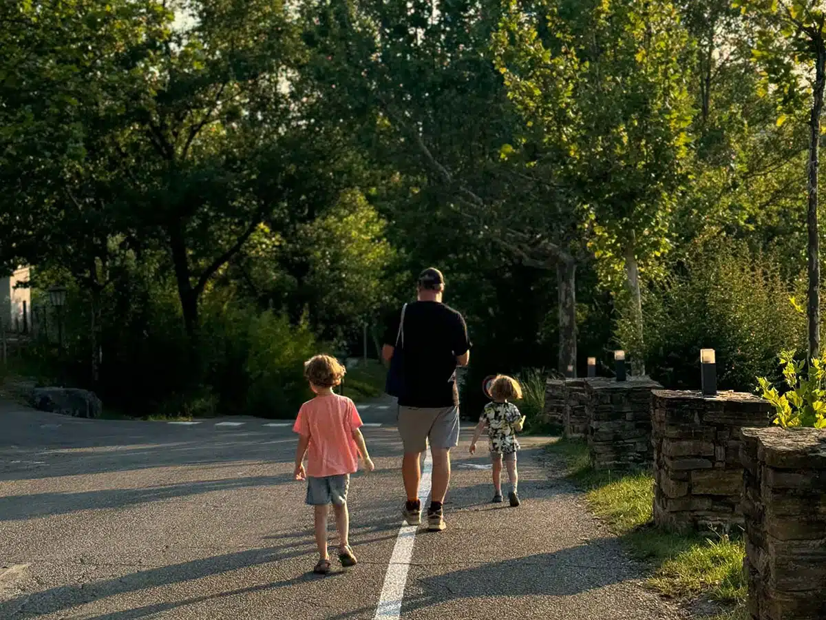 Steve and kids walking around Eurocamp Le Pommier.