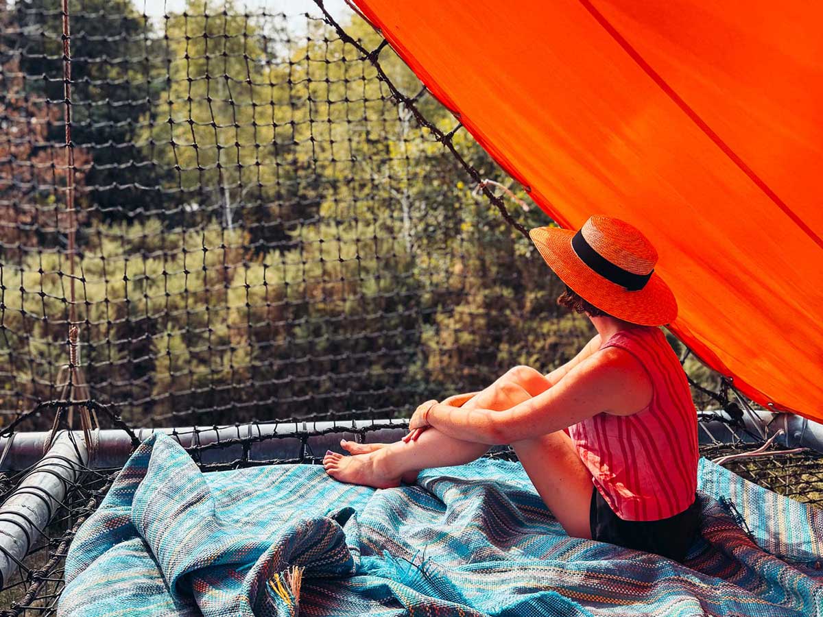Victoria admiring the tree views from the tent at La Belle Folie.