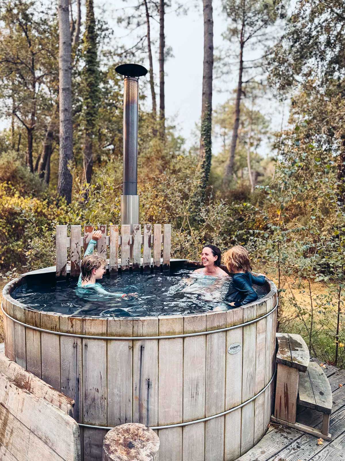 Victoria and kids in the jacuzzi at La Belle Folie accommodation.